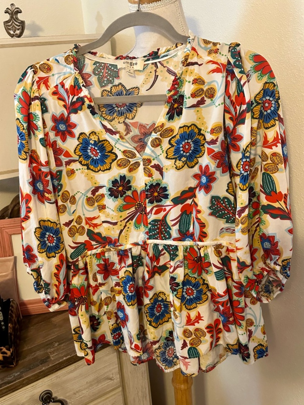 Umgee Cream Floral Peplum Blouse with Red, Blue & Yellow Accents
